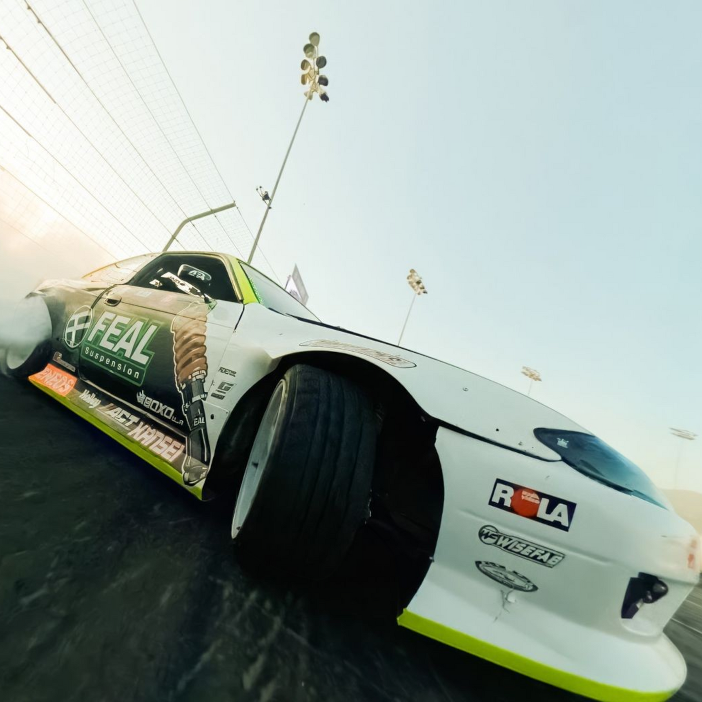alAsil GoPro MAX2 360 camera capturing a white drift car in action on a race track with motion blur