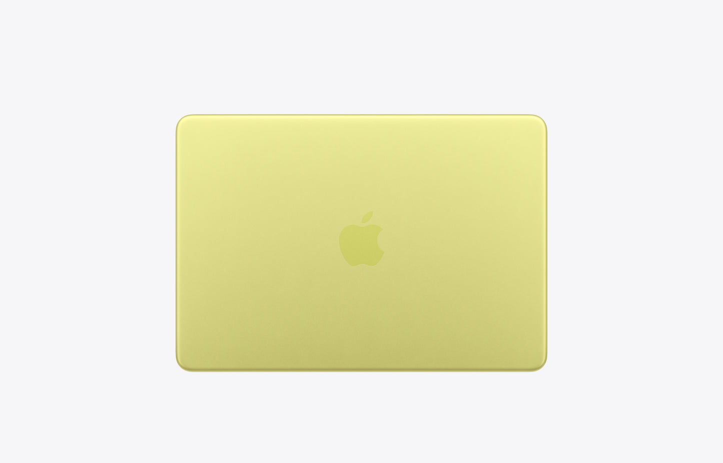 Apple MacBook in a vibrant citrus yellow color, seen from the back with a logo prominently displayed.