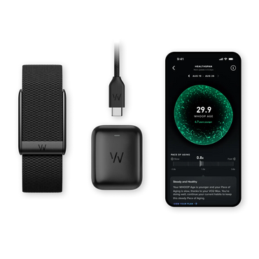Black health and fitness tracker with charging cable, case, and smartphone displaying app interface on a white background.