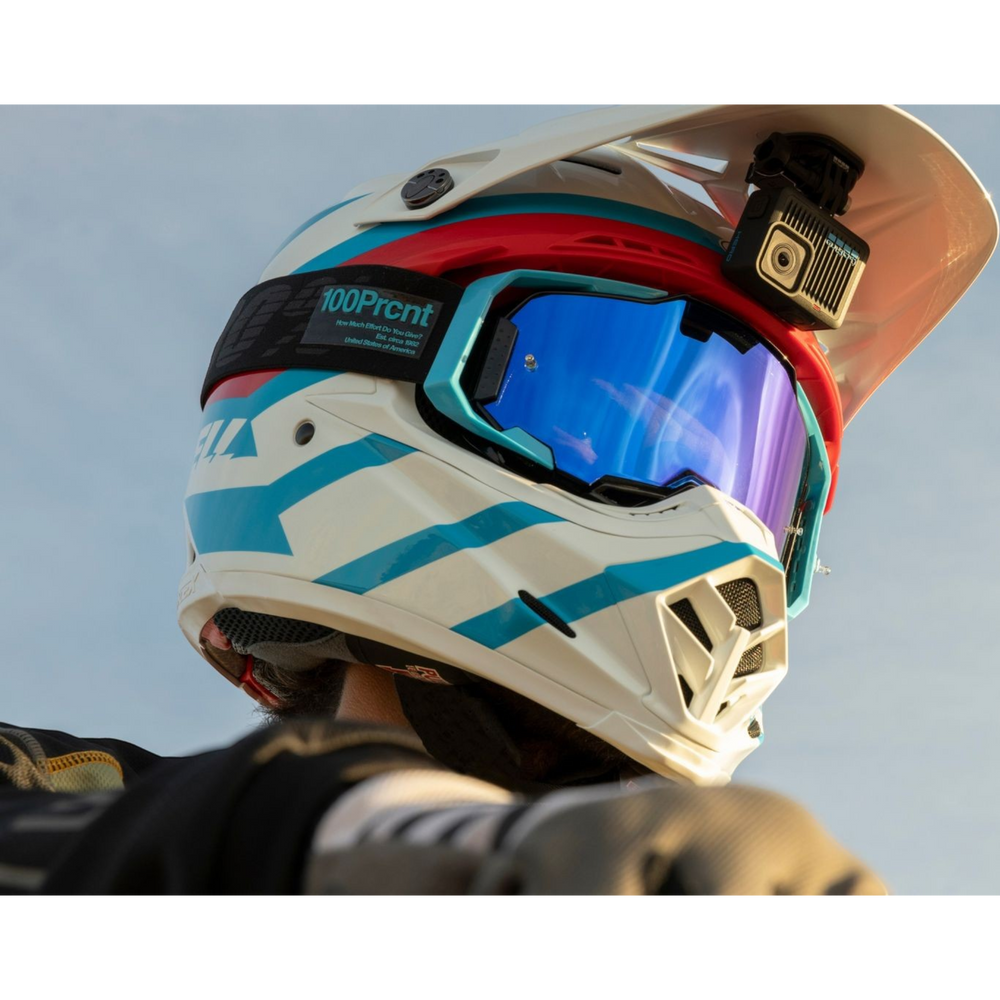 alAsil GoPro HERO action camera mounted on a motocross helmet with blue mirrored goggles against a clear sky