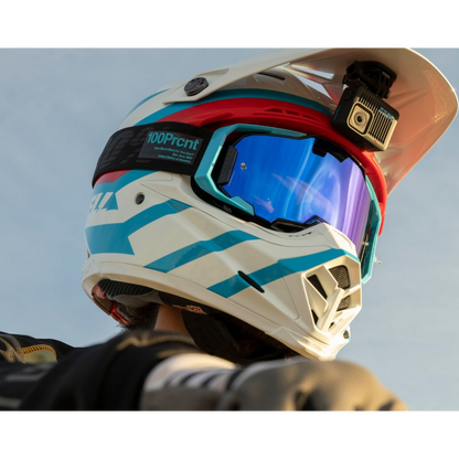alAsil GoPro HERO action camera mounted on a motocross helmet with blue mirrored goggles against a clear sky