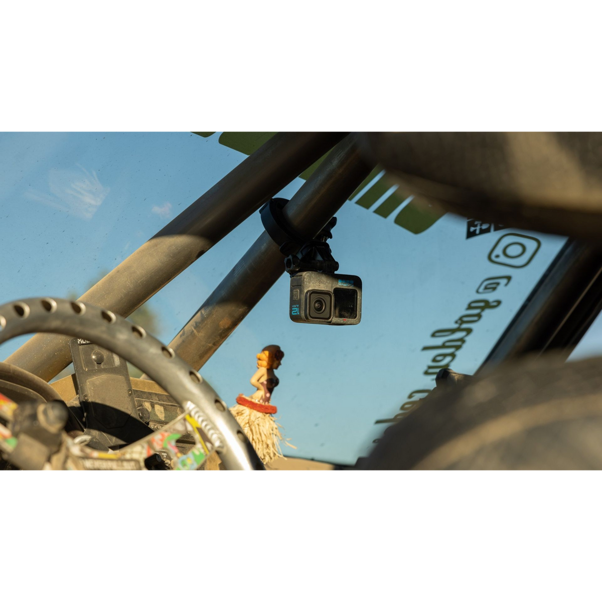 alAsil GoPro HERO12 Black action camera mounted inside a vehicle roll cage for off-road filming
