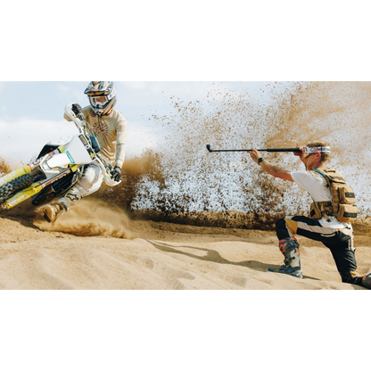 alAsil GoPro HERO13 Black action camera capturing a motocross rider kicking up sand in the desert