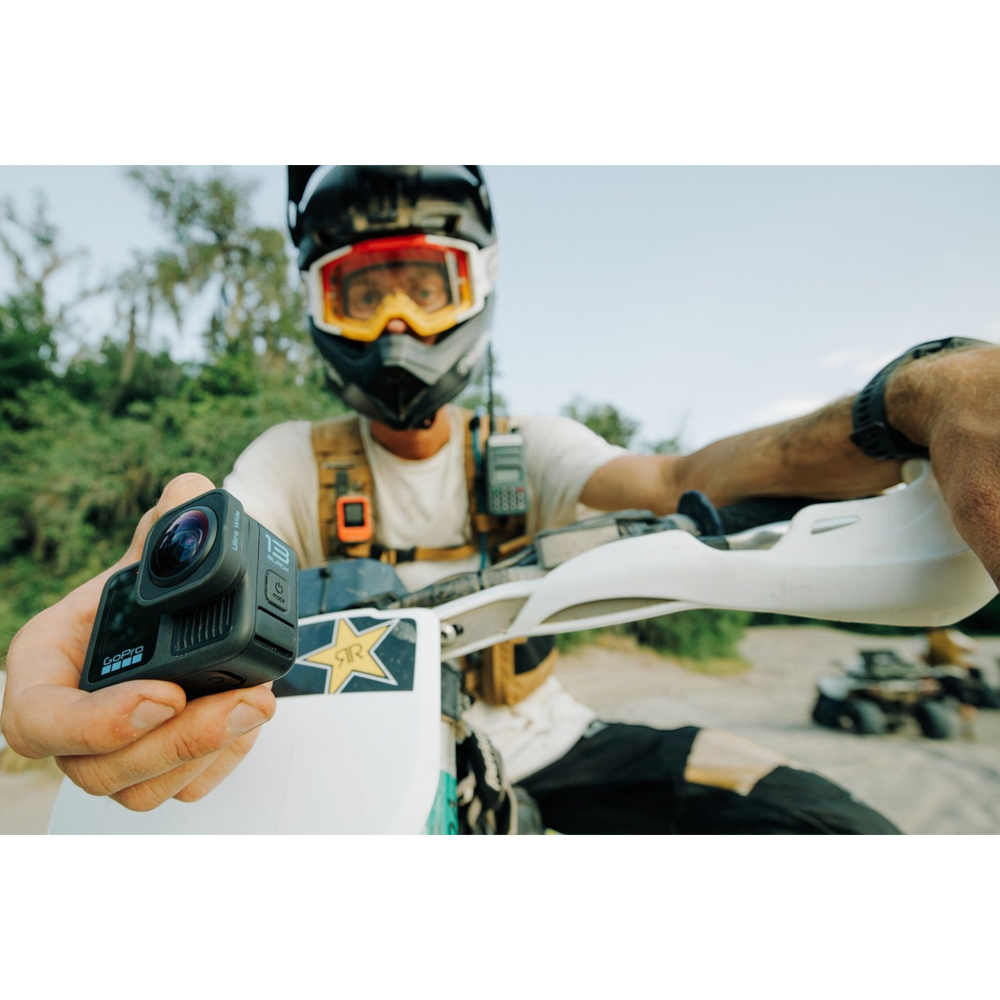 alAsil GoPro HERO13 Black Ultra Wide Edition action camera held by a motocross rider in gear for immersive POV shots