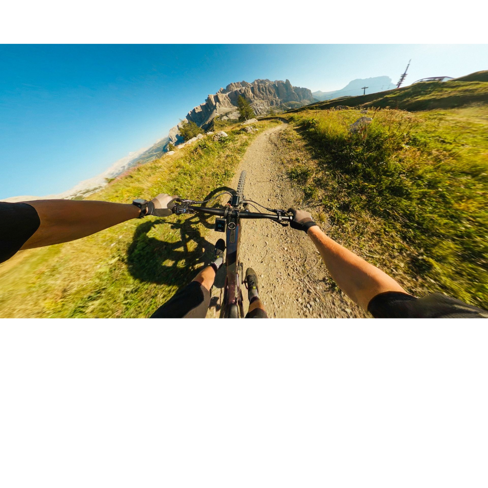 alAsil GoPro HERO13 Black Ultra Wide Edition capturing an immersive POV mountain bike ride on a sunny trail