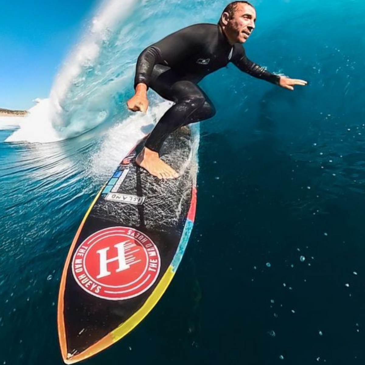 alAsil GoPro MAX 360 camera capturing a surfer riding a large wave in the ocean
