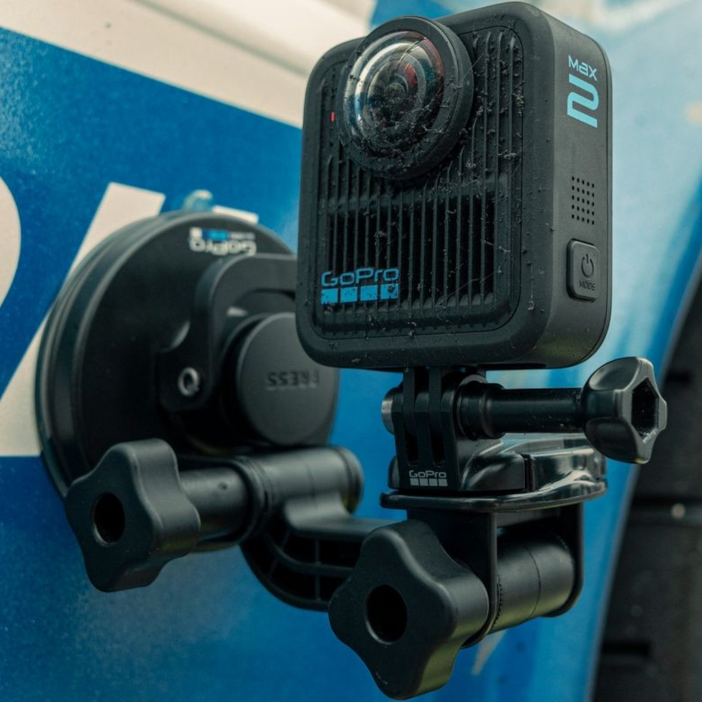 alAsil GoPro MAX2 360 camera mounted on a vehicle surface with a suction cup mount for action recording