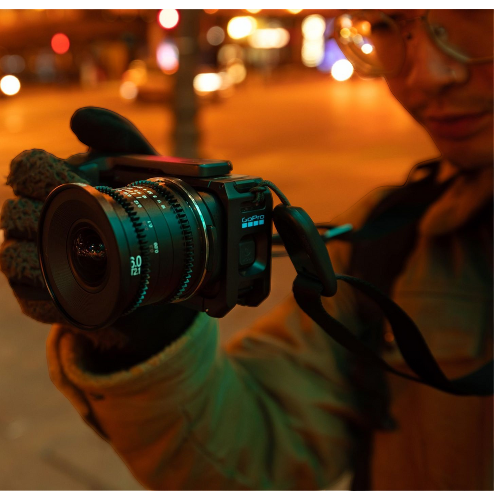 alAsil GoPro MISSION 1 PRO ILS cinema camera with Micro Four Thirds lens mount held by a creator at night