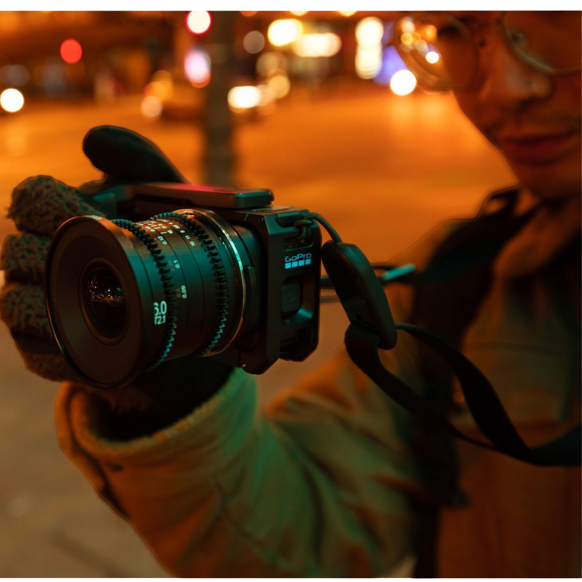 alAsil GoPro MISSION 1 PRO ILS cinema camera with Micro Four Thirds lens mount held by a creator at night