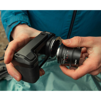 alAsil GoPro MISSION 1 PRO ILS cinema camera with Micro Four Thirds lens mount being attached by a person
