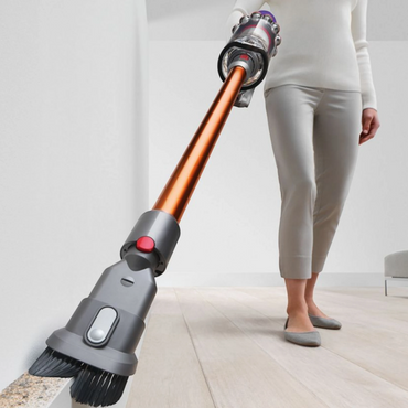 Dyson V10 Total Clean Cordless Vacuum in use
