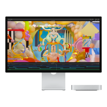 Apple Mac Mini M2 setup on desk with external monitor for creative and professional use