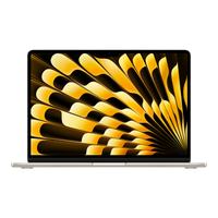 13-inch MacBook Air in Starlight, showcasing a vibrant yellow abstract wallpaper on its Retina display.