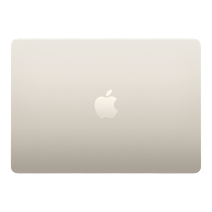 Apple MacBook Air M5 13-inch in Starlight with an embossed Apple logo on the lid.