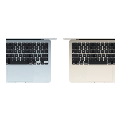 Top view of two MacBook Air M5 13-inch laptops in space gray and gold color options.