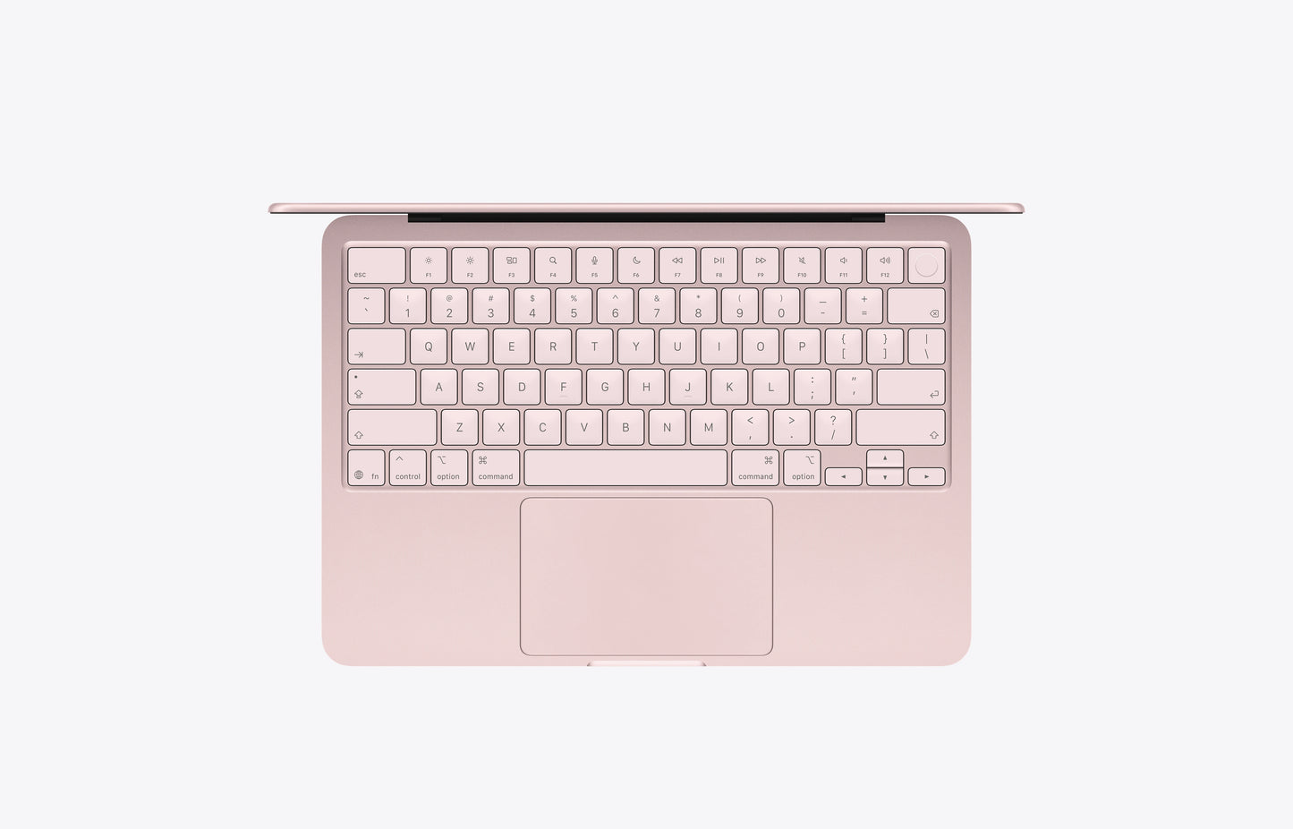 Top view of a MacBook Neo in blush color featuring a 512GB storage keyboard and touchpad.