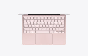 Top view of a MacBook Neo in blush color featuring a 512GB storage keyboard and touchpad.