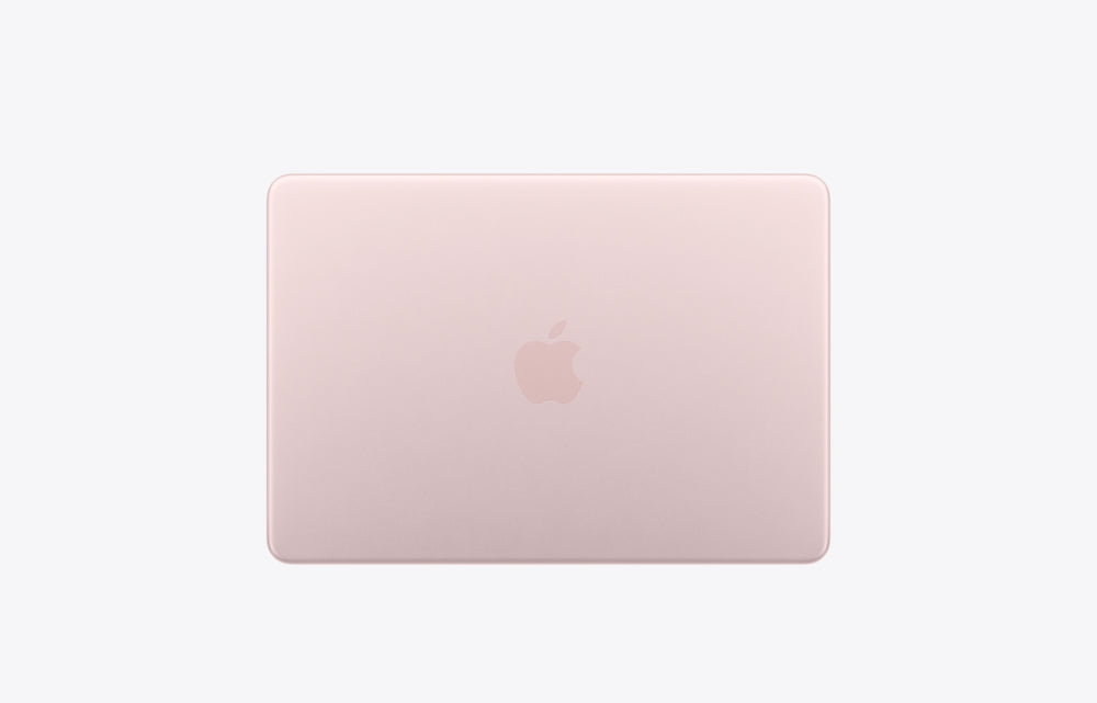 Apple MacBook in blush pink color, viewed from the back with the logo prominently displayed.