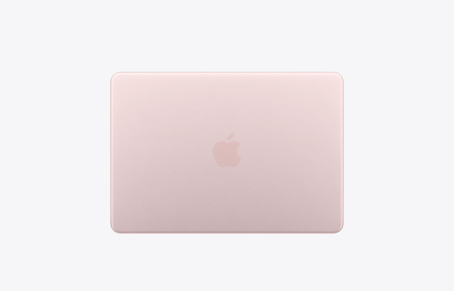 Apple MacBook in blush pink color, viewed from the back with the logo prominently displayed.