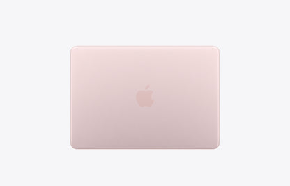 Apple MacBook in blush pink color, viewed from the back with the logo prominently displayed.