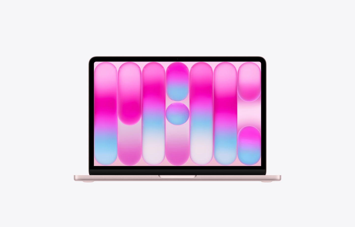 MacBook Neo in blush color displaying a vibrant pink and blue abstract pattern on the screen.