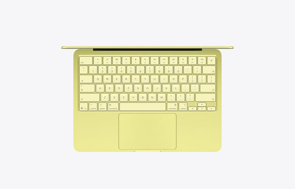 Top view of a vibrant yellow MacBook Neo Citrus with a 256GB storage capacity.