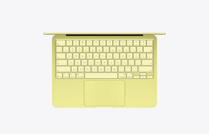 Top view of a yellow MacBook Neo Citrus with a 512GB SSD, showcasing the keyboard and trackpad.
