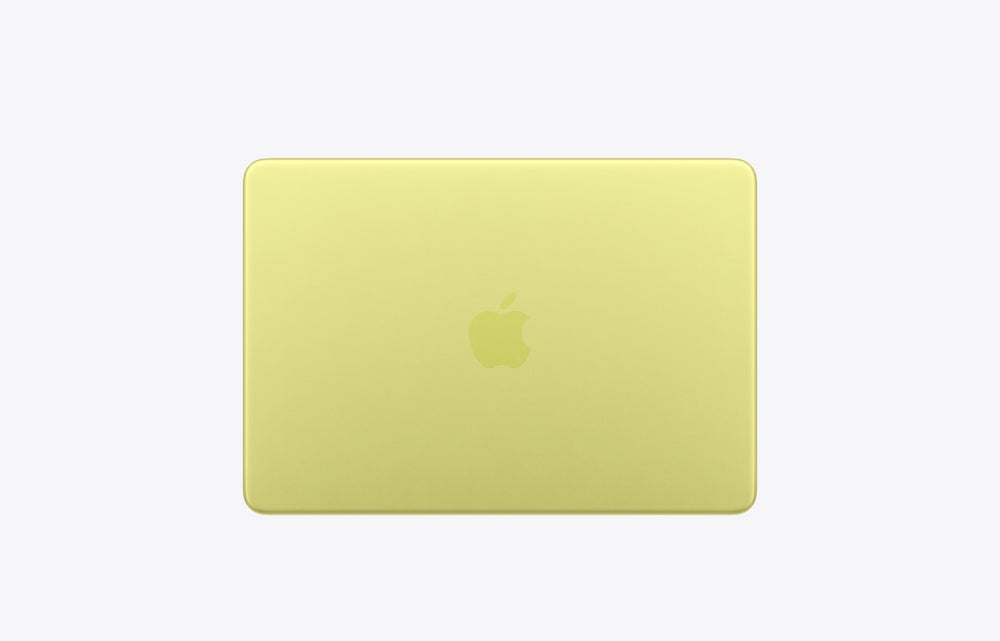 Apple MacBook in a vibrant citrus yellow color, seen from the back with a logo prominently displayed.