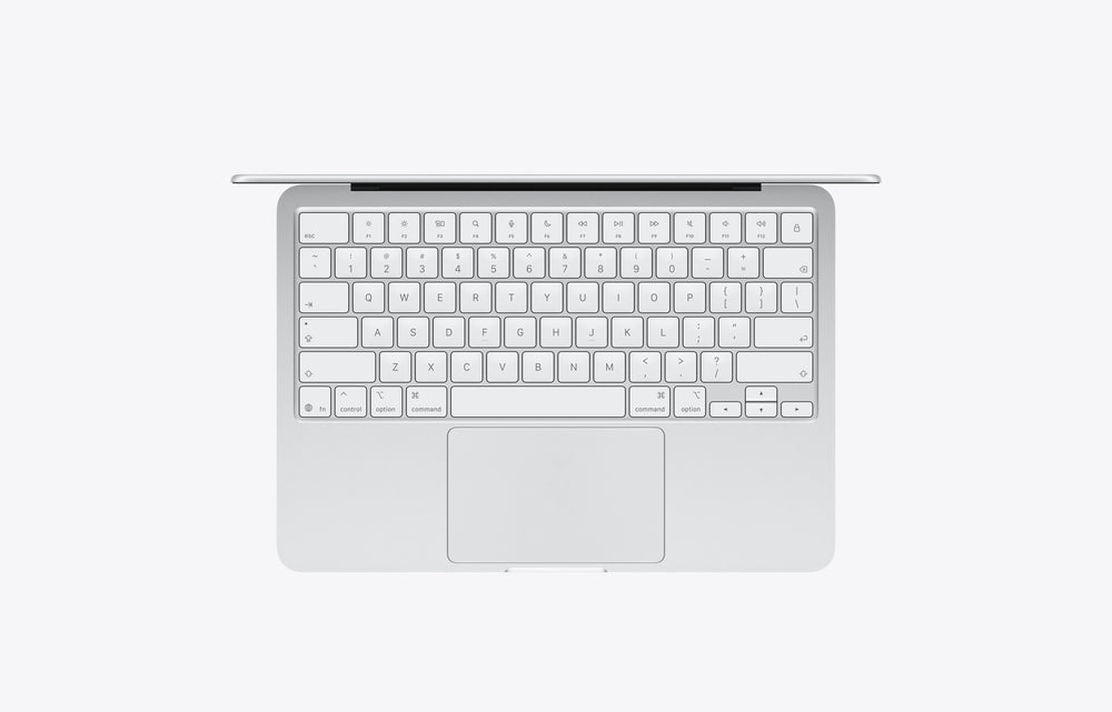 Top view of a silver MacBook Neo with a 256GB storage featuring a sleek keyboard and touchpad.