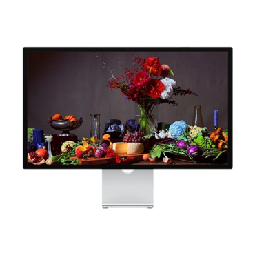 Computer monitor displaying a colorful arrangement of fruits, vegetables, and flowers.